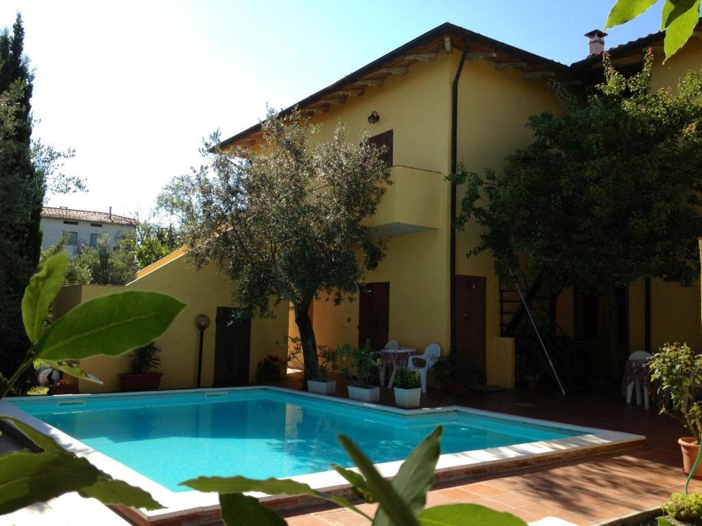Aparthotel Il Porto Tuoro sul Trasimeno Esterno foto